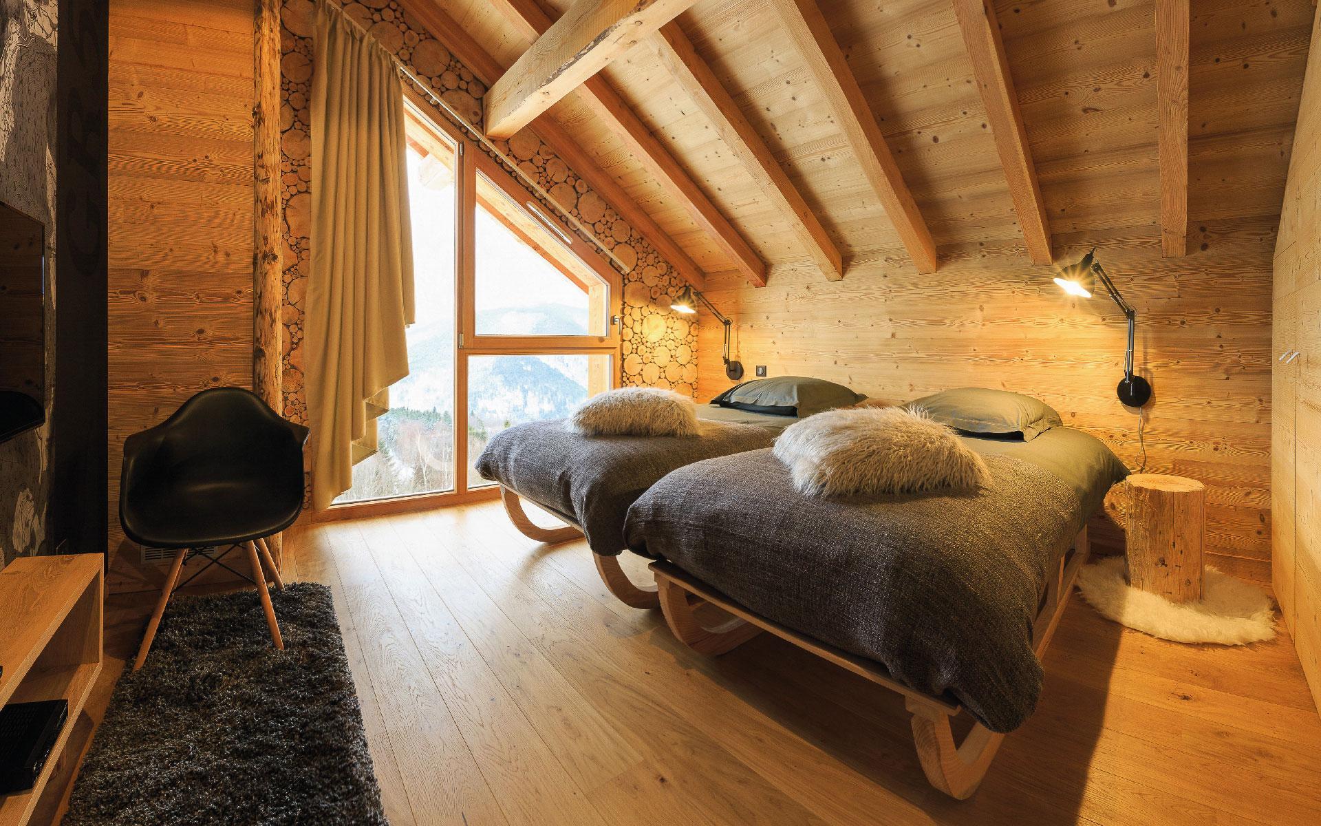 Chambre chalet bois nature avec vue imprenable sur les Vosges et la vallée de Munster.